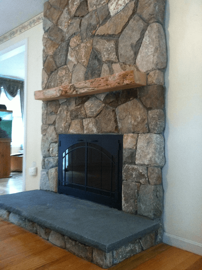 Stone fireplace by Deluca Masonry