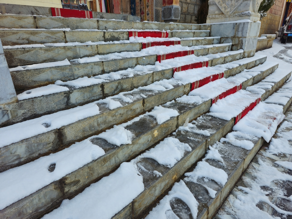 ice and snow on stone stairs